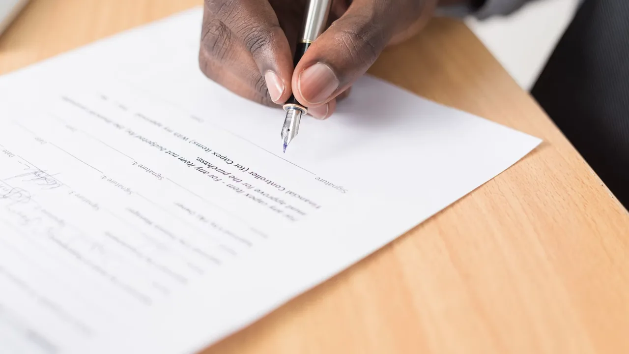 Homeowner reviewing a roofing contract before signing